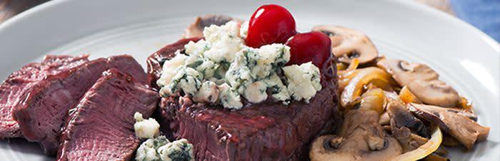 Beef steak with mushroom and cherry sauceimage